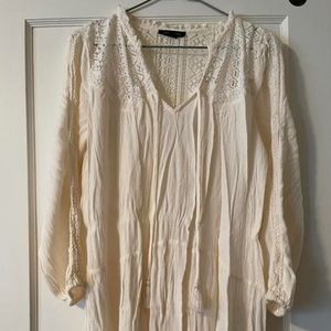 cream coloured v neck blouse from american eagle.